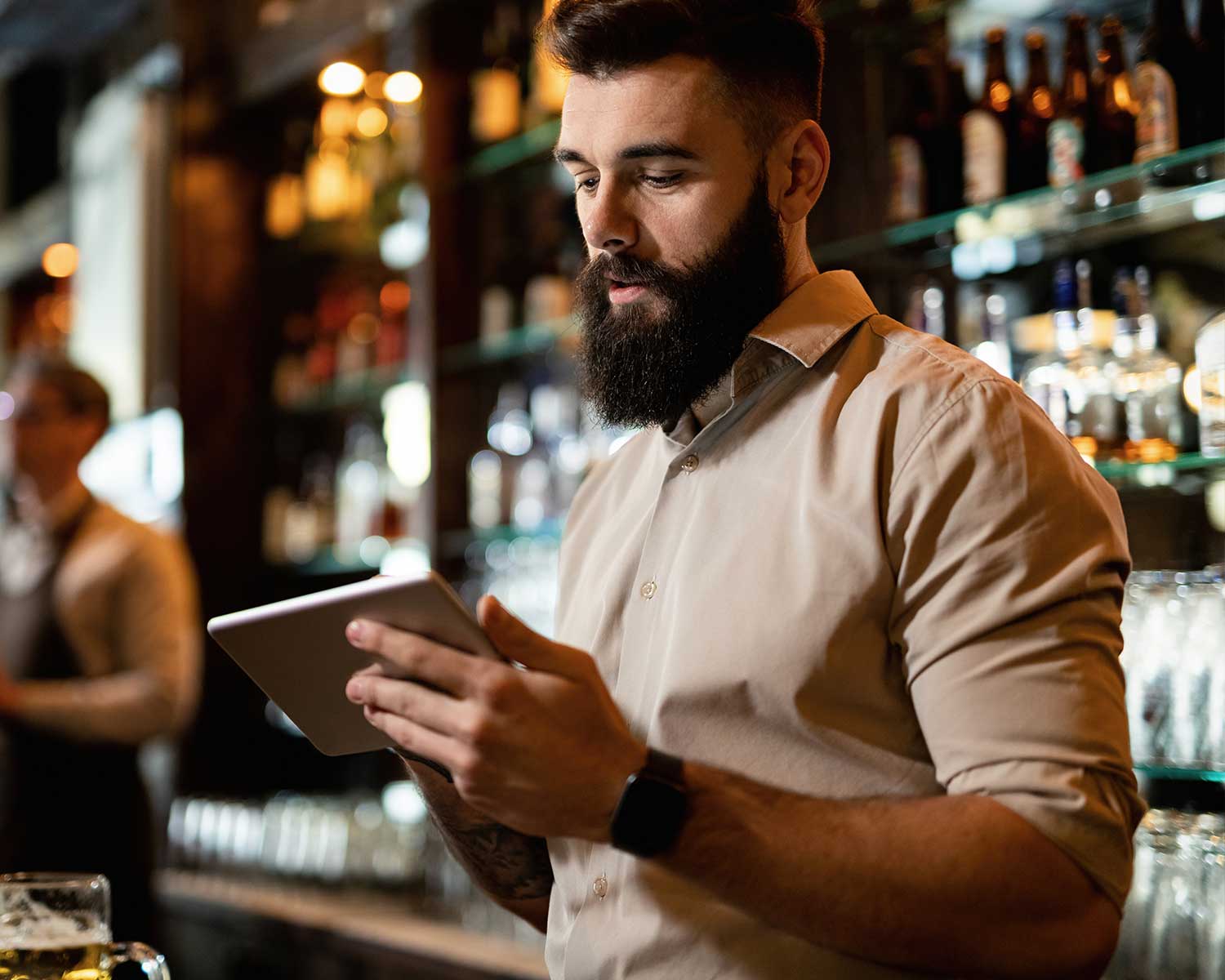 man holding an ipad a familiar interface