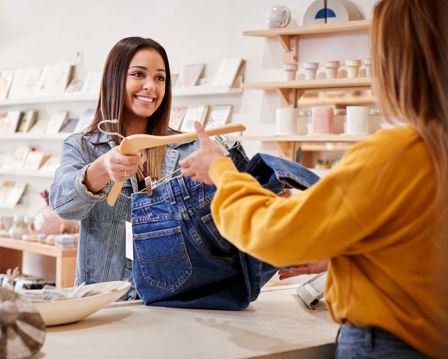 woman purchasing jeans