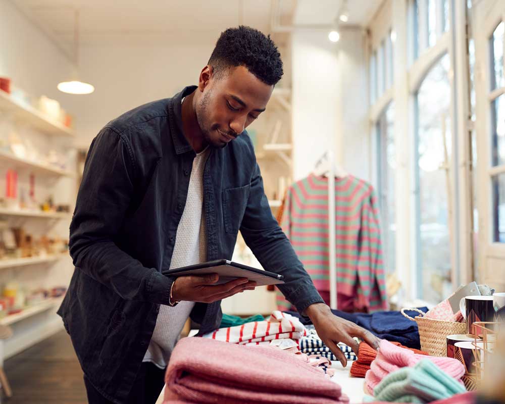 man checking inventory | iPad Point of Sale for Retail